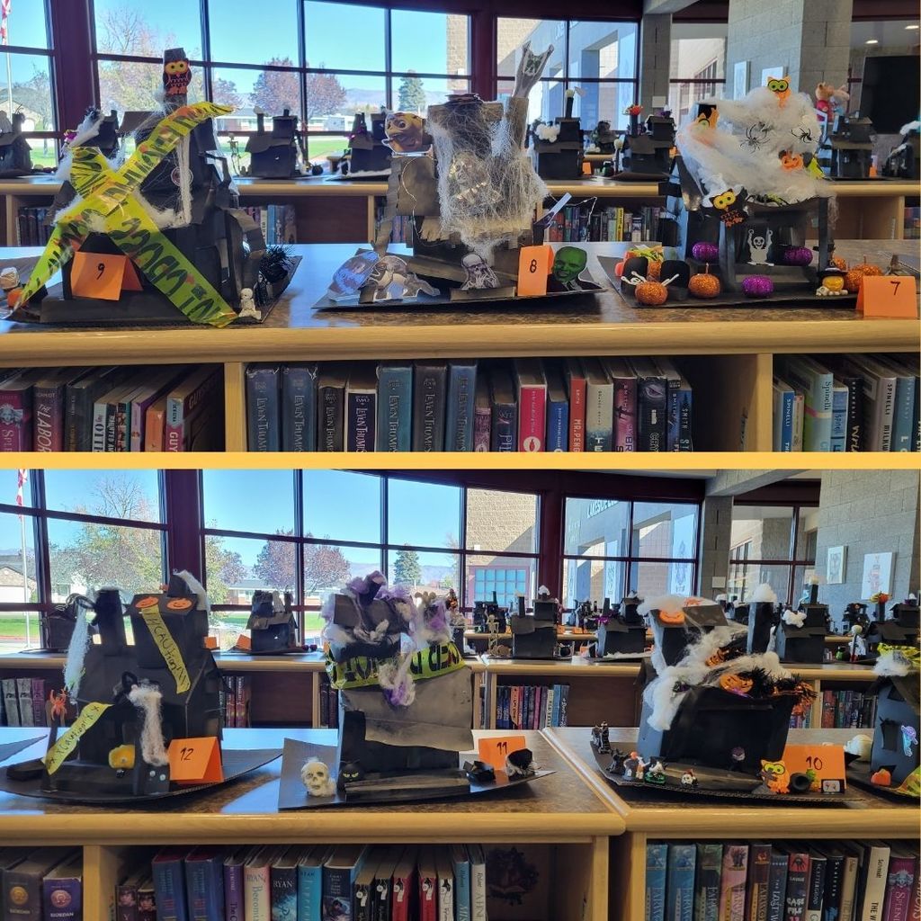 Haunted Houses constructed out of paper and decorated with various Halloween Decorations.