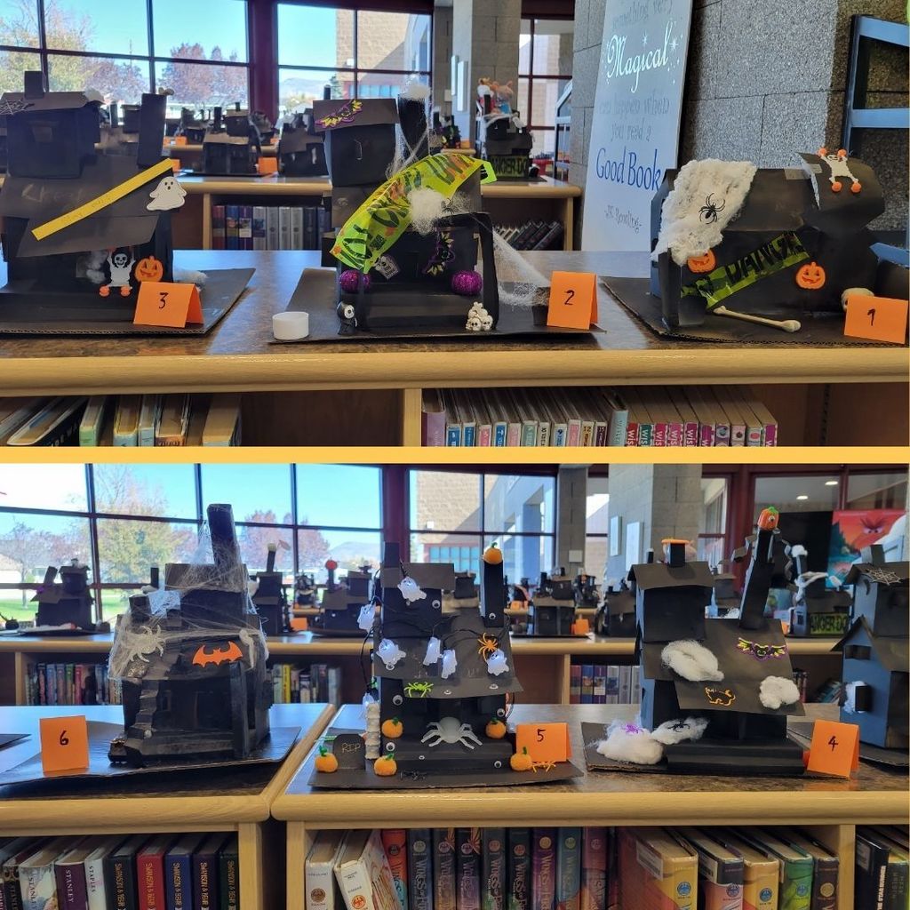 Haunted Houses constructed out of paper and decorated with various Halloween Decorations.