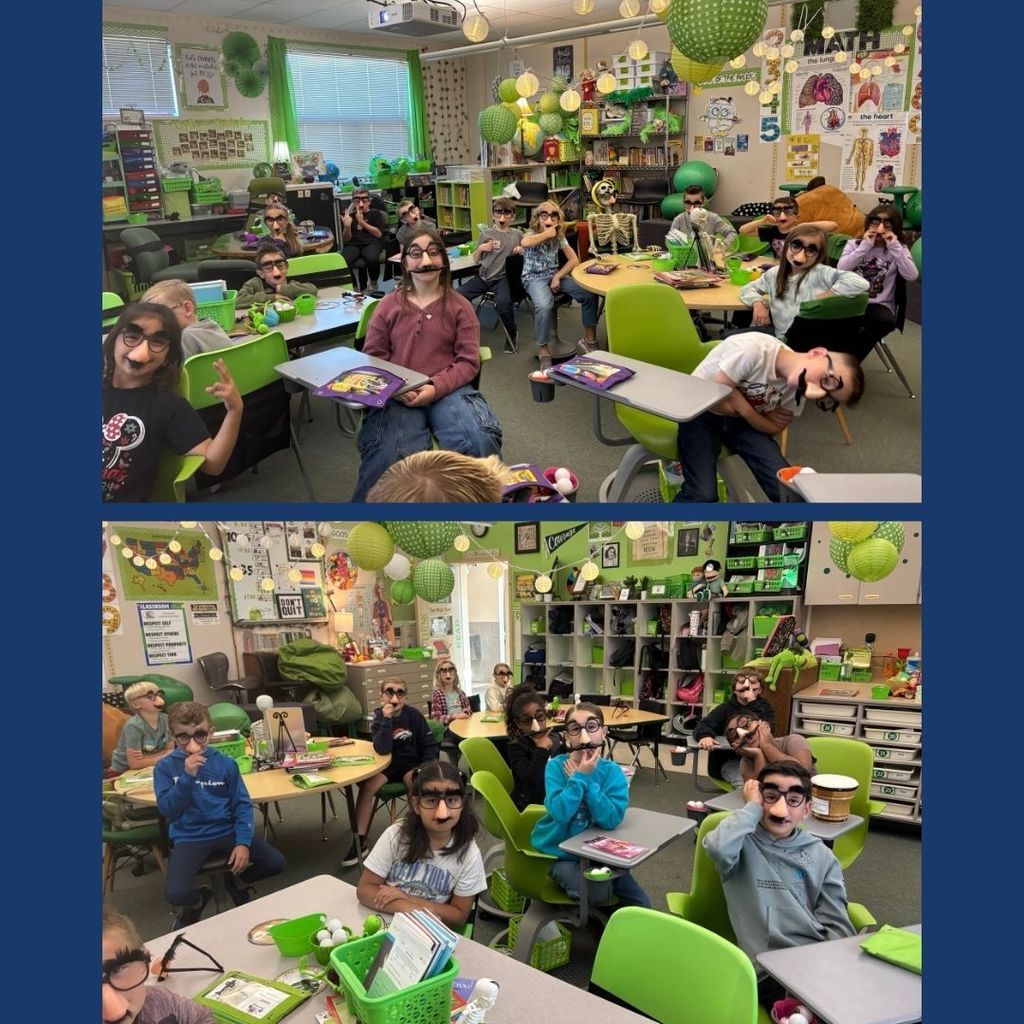Students in a classroom wearing funny glasses with a big nose and mustache.