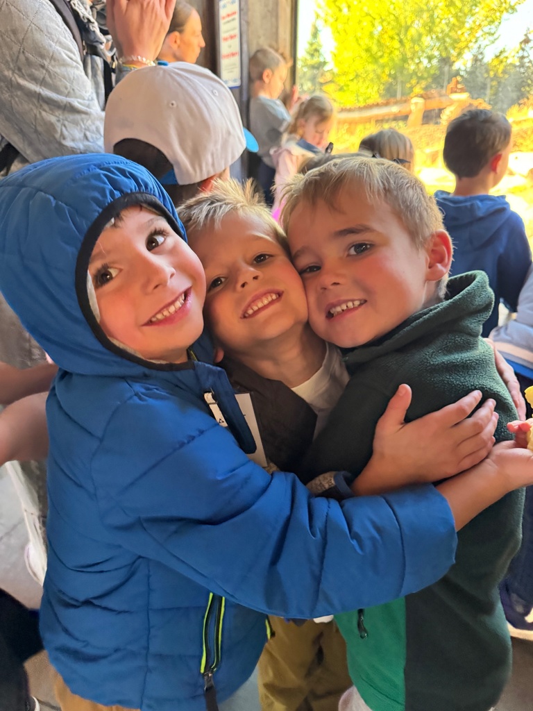 students hugging each other