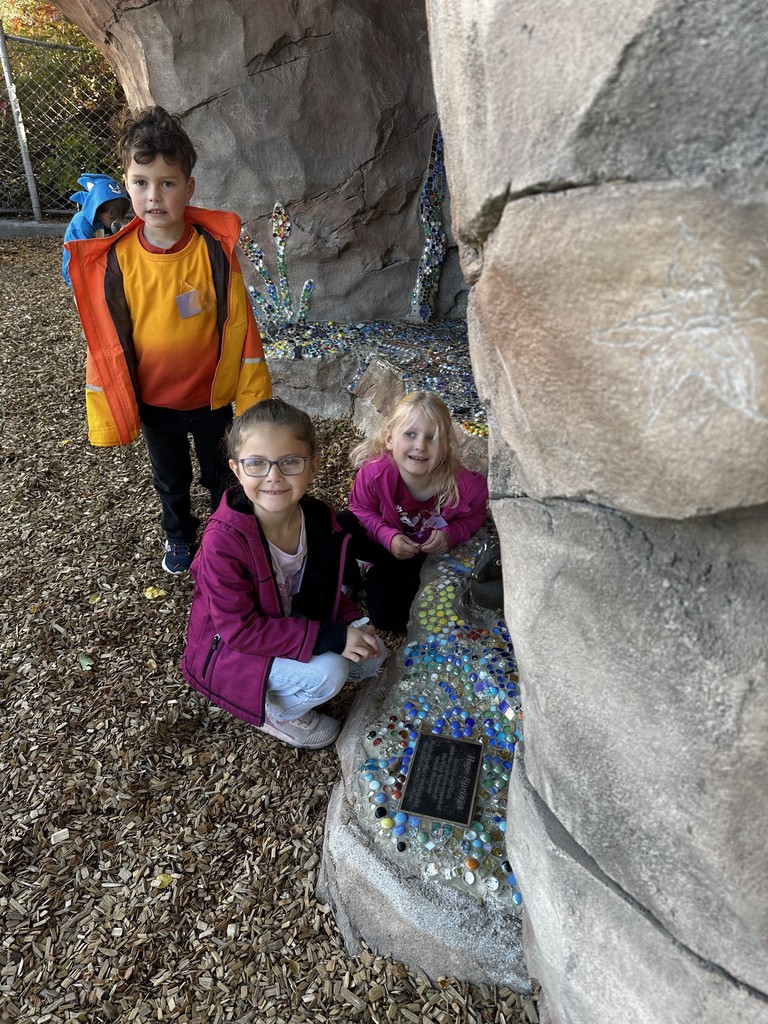 students pictured outdoors at the zoo
