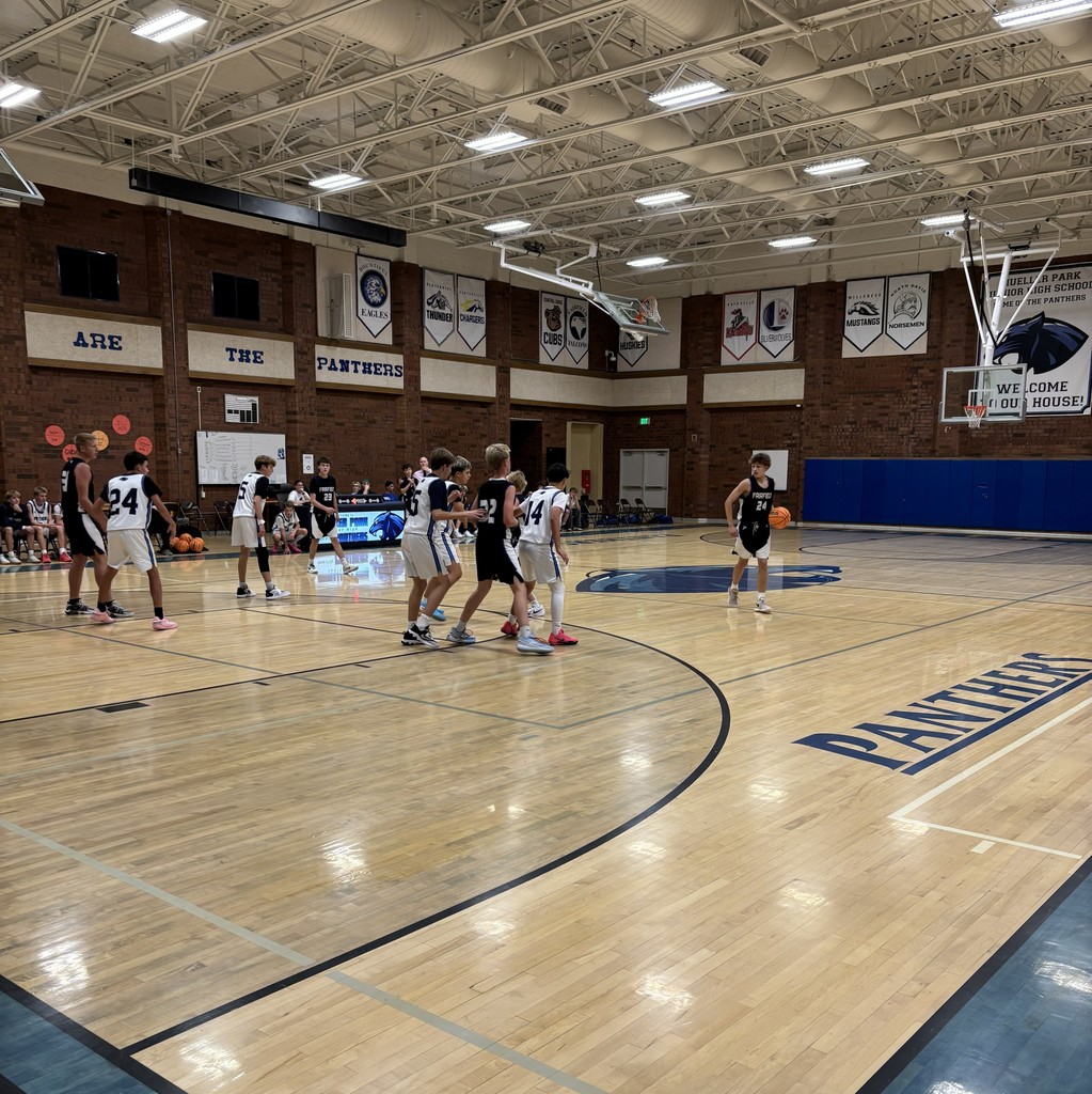 Fairfield Basketball, in Black, is competing with Mueller Park in White