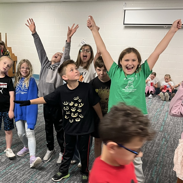 Here you can see our fourth grade students showing off their excitement for root beer floats!