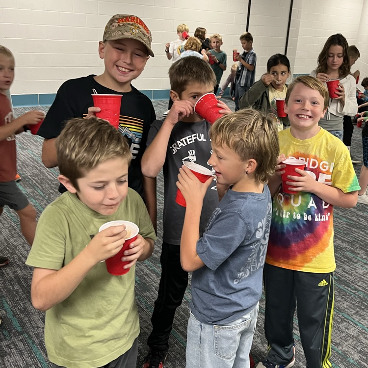 More fourth grade students can be seen enjoying their root beer float party.
