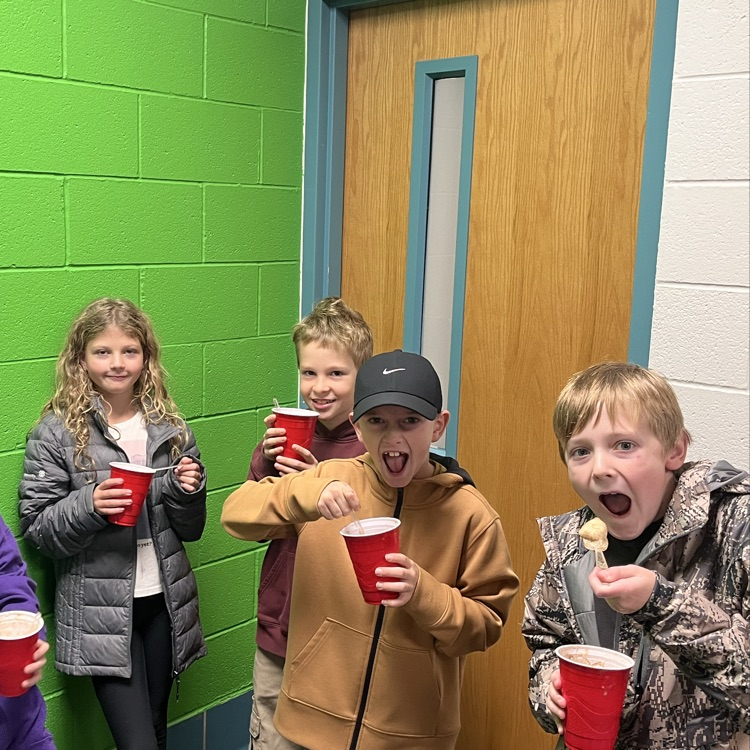 students shown enjoying root beer floats