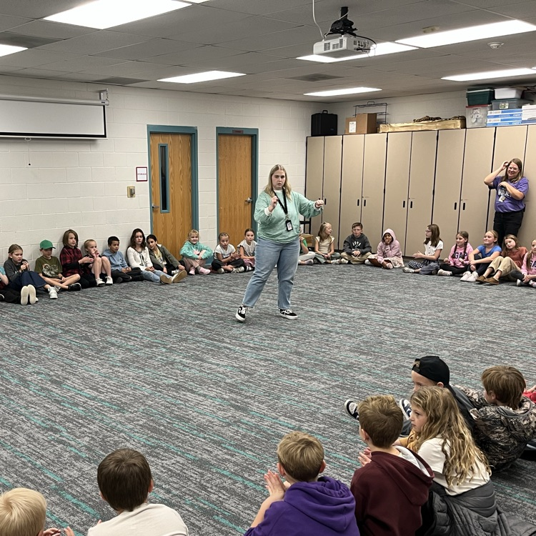 after the celebration, Mrs. Olson led the group in some very fun whole grade games.