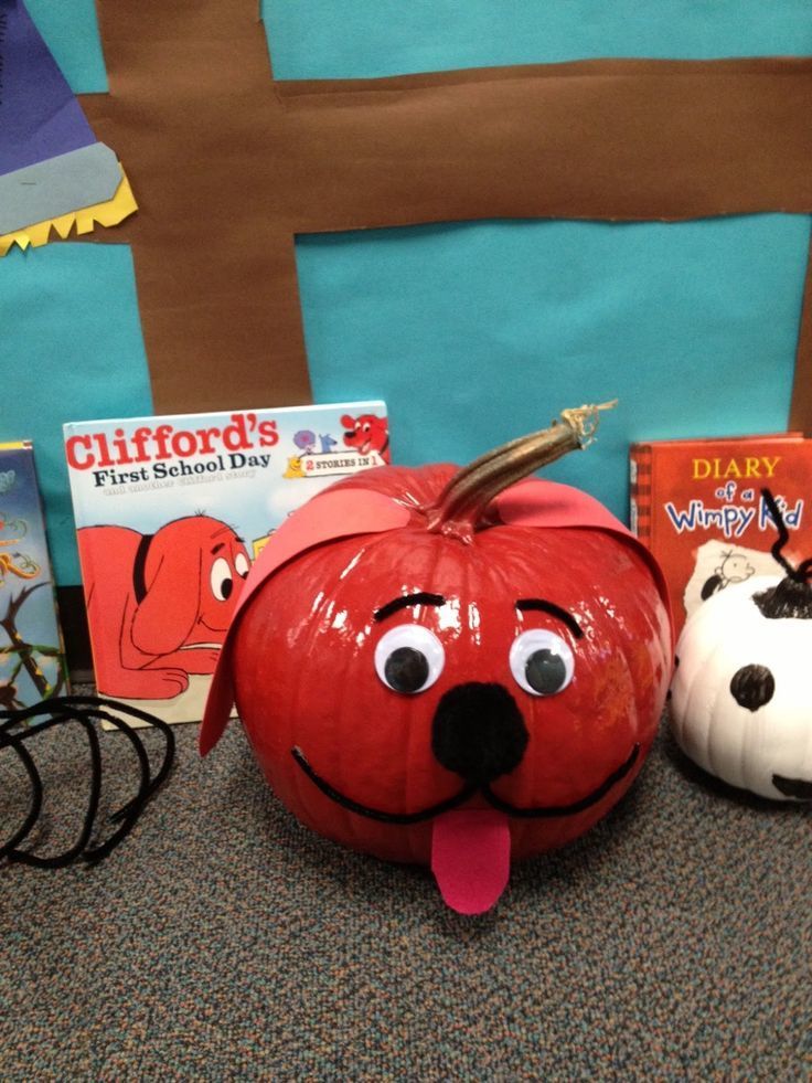 pumpkin decorated to look like Clifford the Big Red Dog.