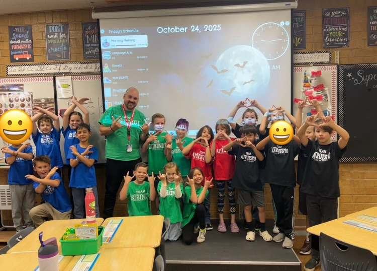 3rd graders posing before running 