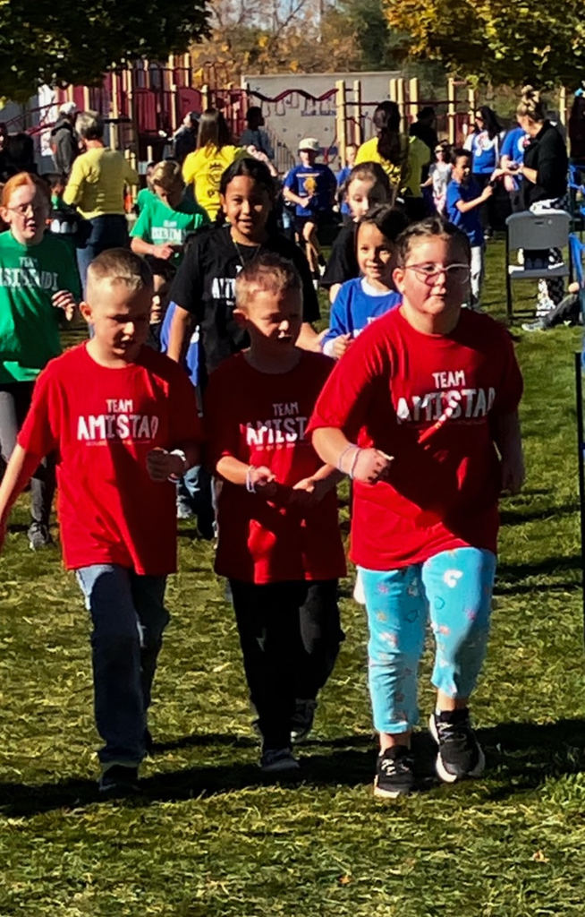 students running and walking 