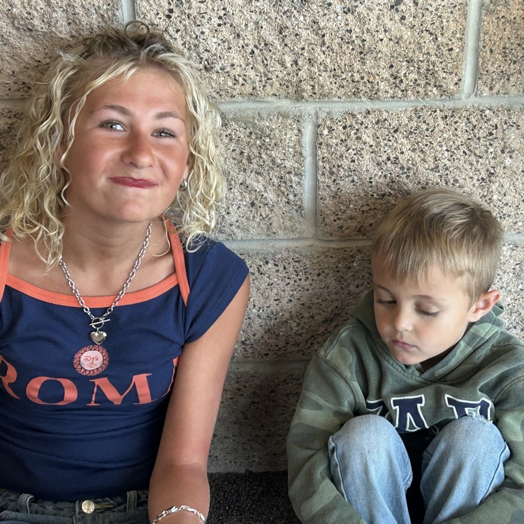 FFJH cheerleaders playing with elementary student