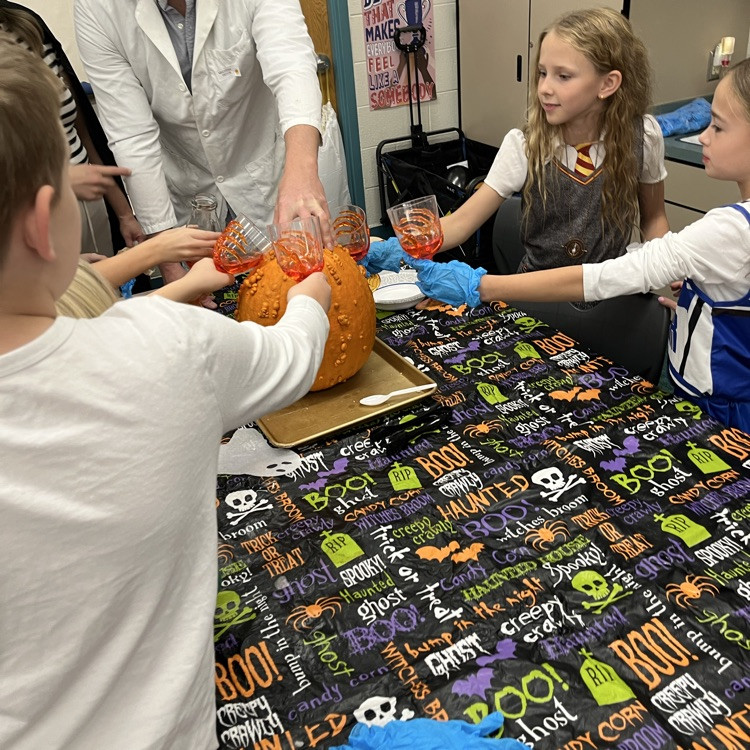 Students can be seen playing games in their class Halloween parties