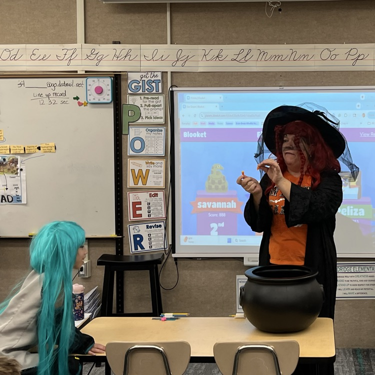 Students can be seen playing games in their class Halloween parties.