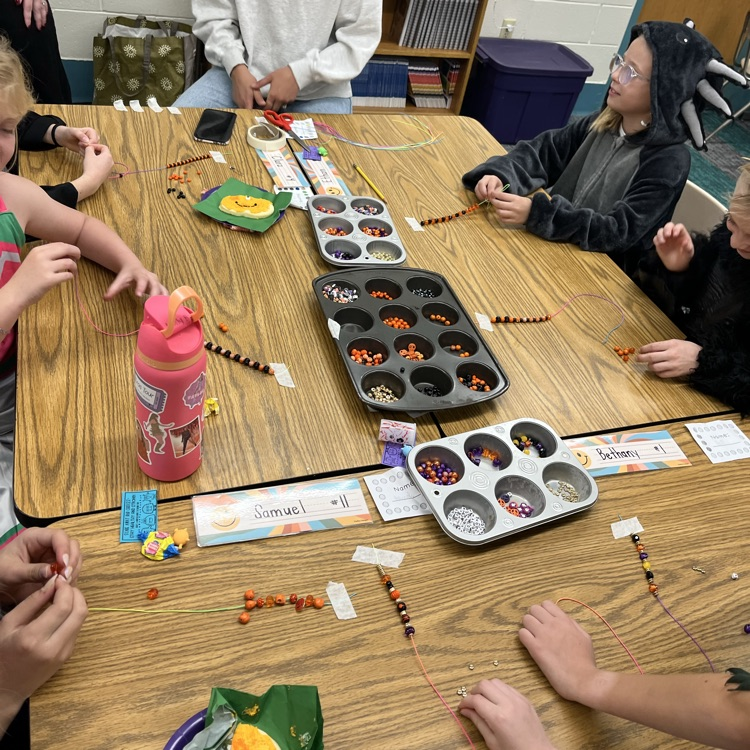 Students can be seen playing games in their class Halloween parties.