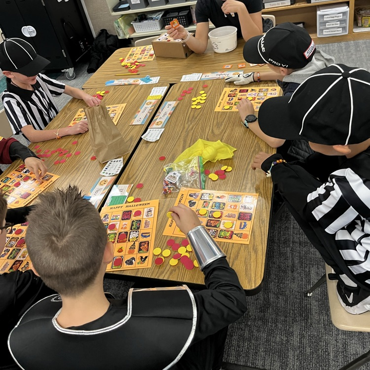 Students can be seen playing games in their class Halloween parties.