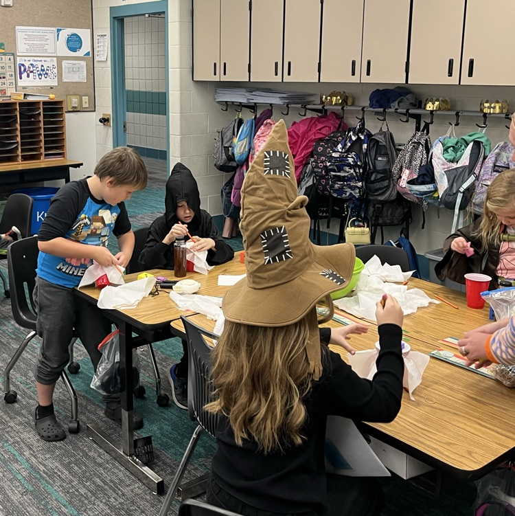 Students can be seen playing games in their class Halloween parties.
