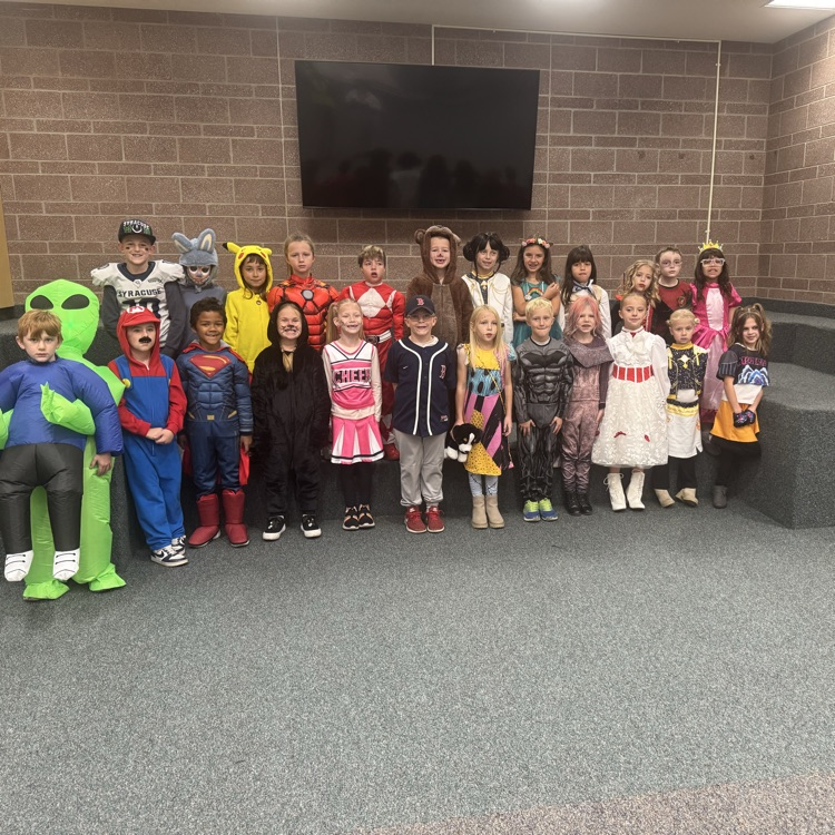 Class of students and costume post