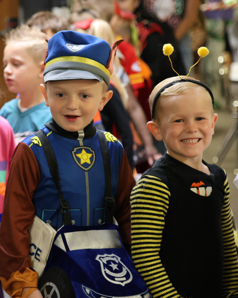 Students wearing Halloween costumes.