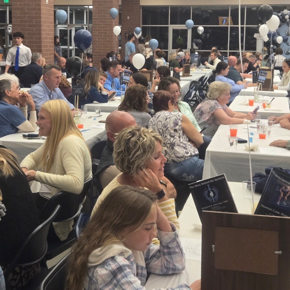 banquet participants eating and talking