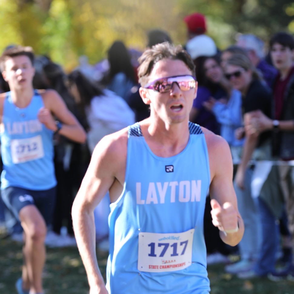 Boy cross country runner #1717 competing at state.