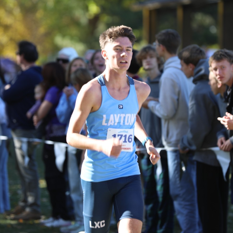Boy cross country runner #1716 competing at state