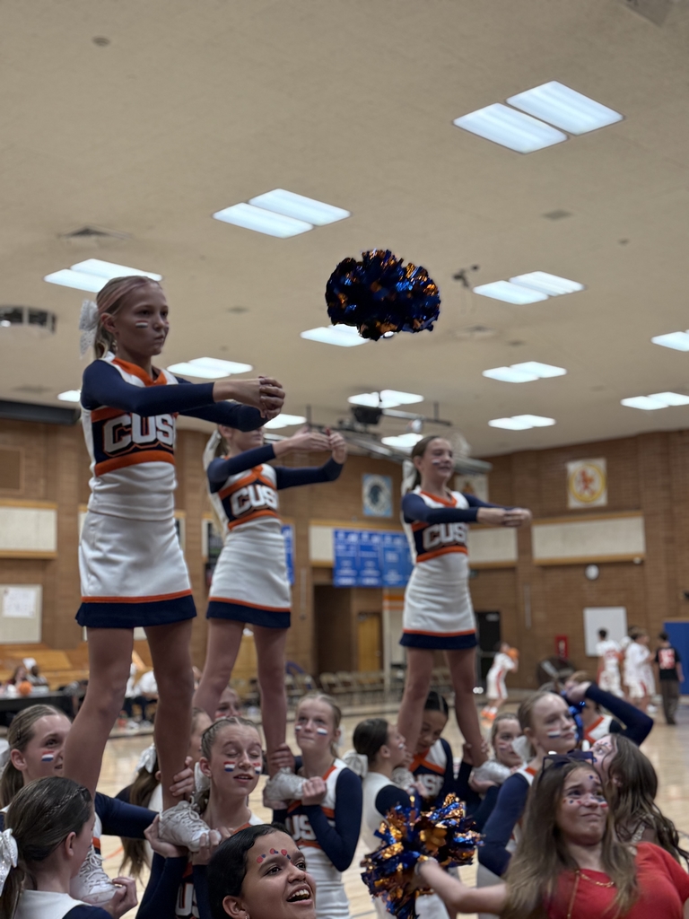 Our cheer squad playing pom pom basketball at the home Basketball game on THUR