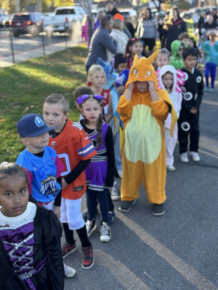 students dressed in costumes for parade.