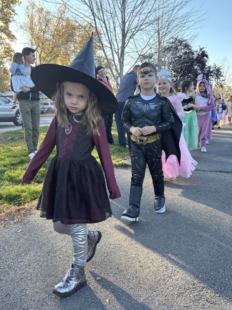 Students dressed in costumes for parade