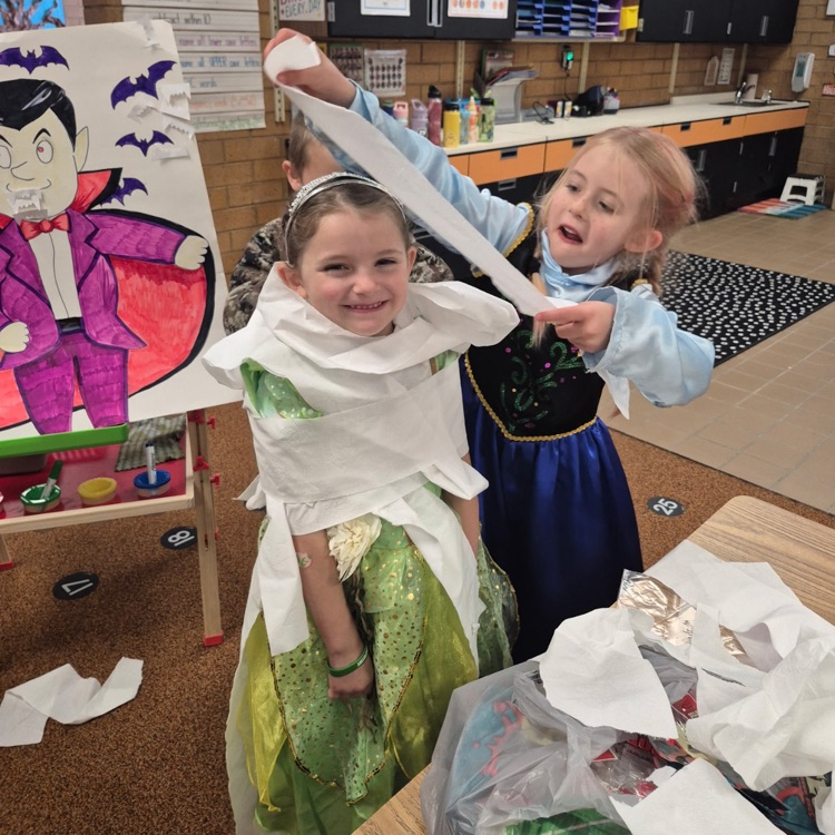 students posing in costumes for Halloween 