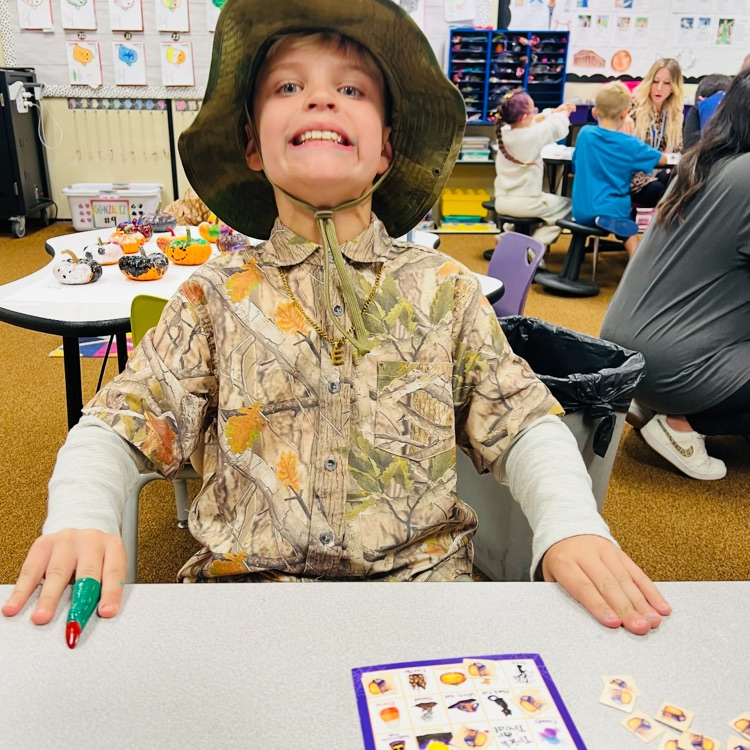 students posing in costumes for Halloween 