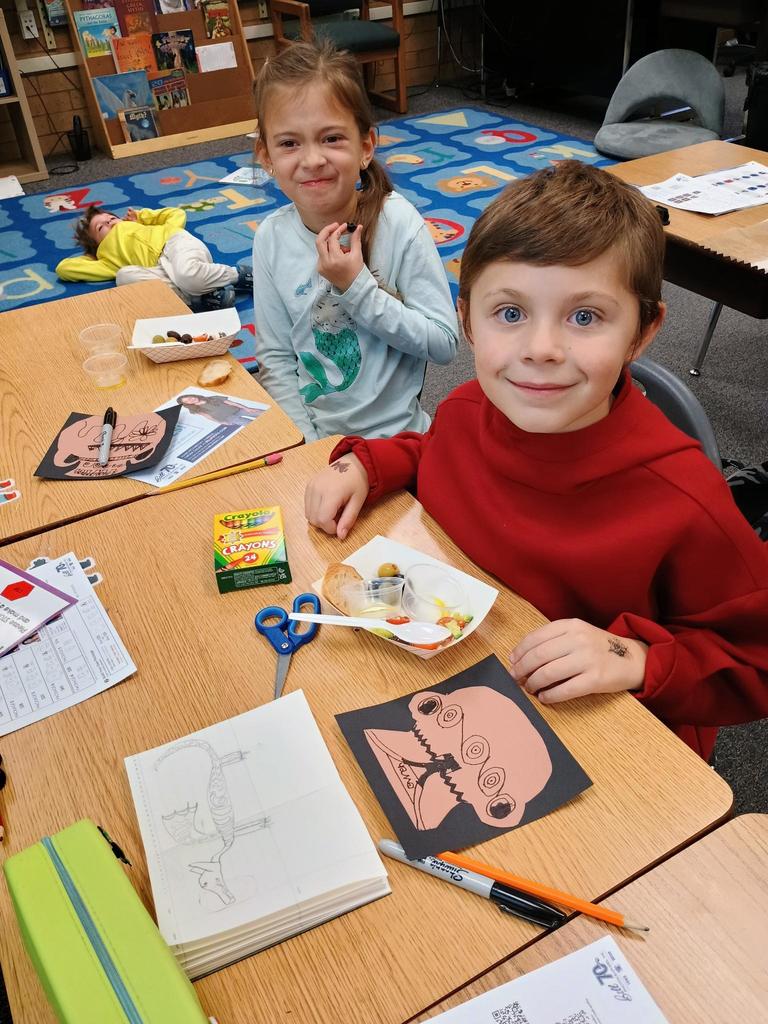 Students from Mrs. Coulliette's class creating Ancient Greek pottery art