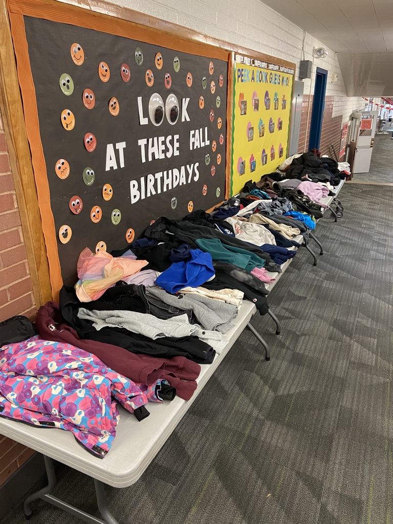 Table with a lot of coats and lost and found items