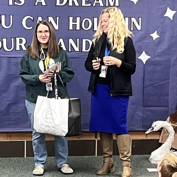 Mrs Hess presented with a gift