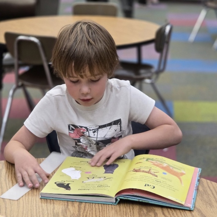 student reading a book