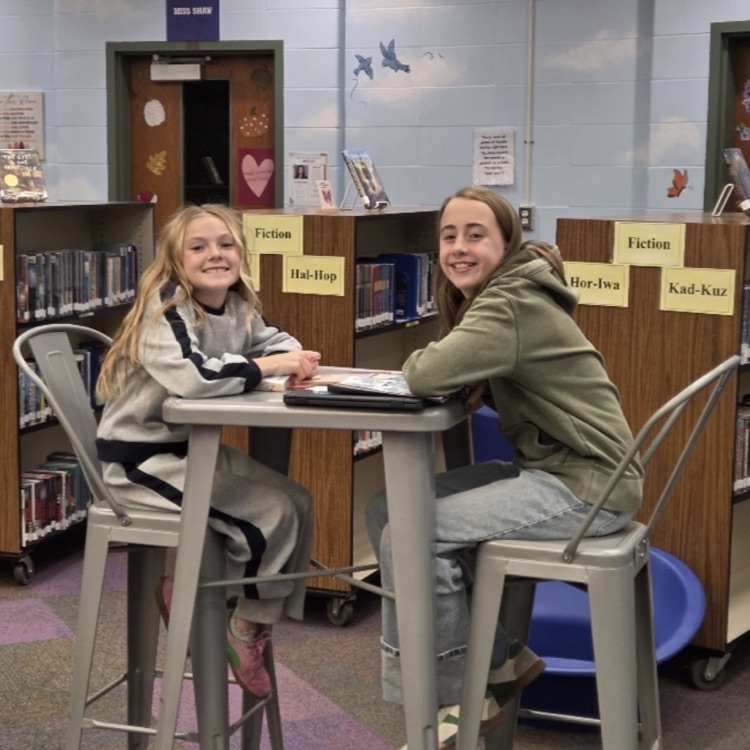 students smiling during library time 