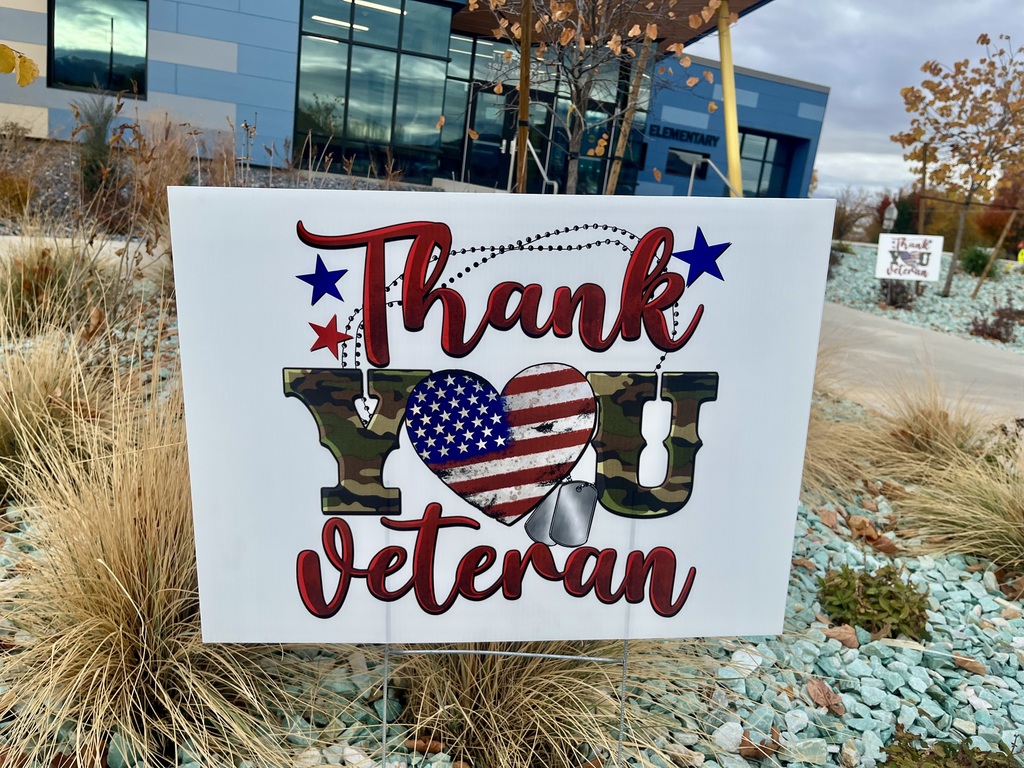 A sign that says: "Thank You Veteran"
