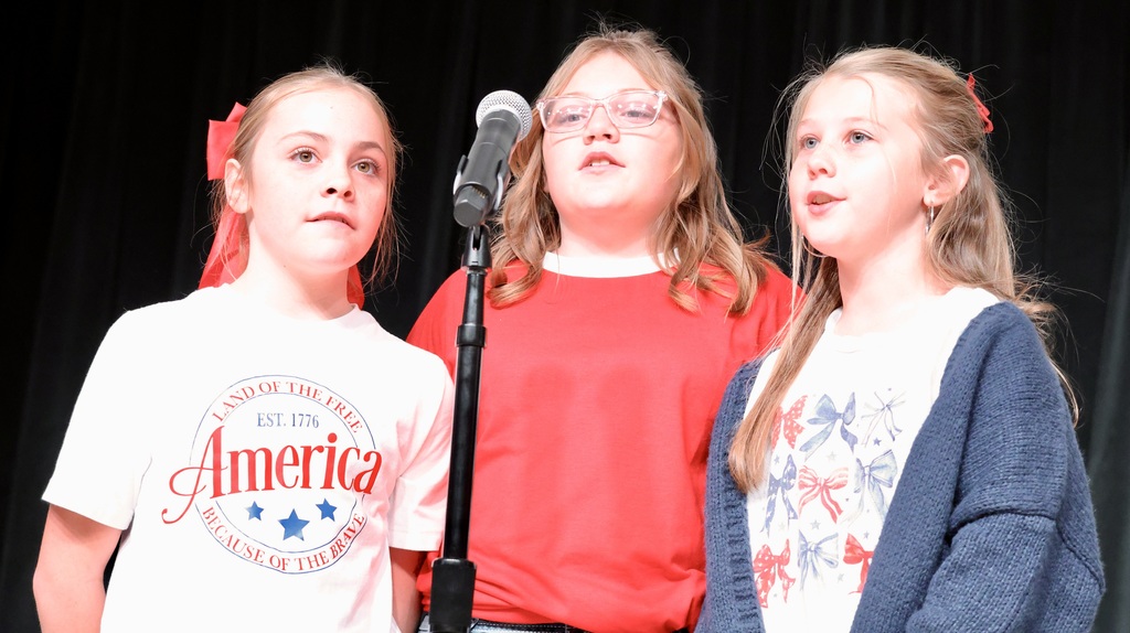 Two students singing. 