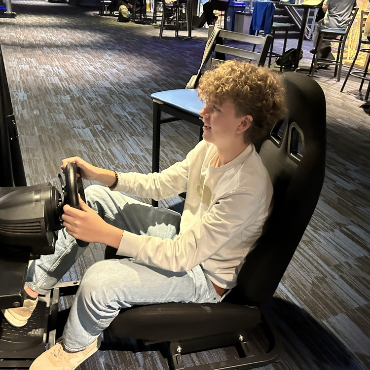 students exploring the planetarium exhibits