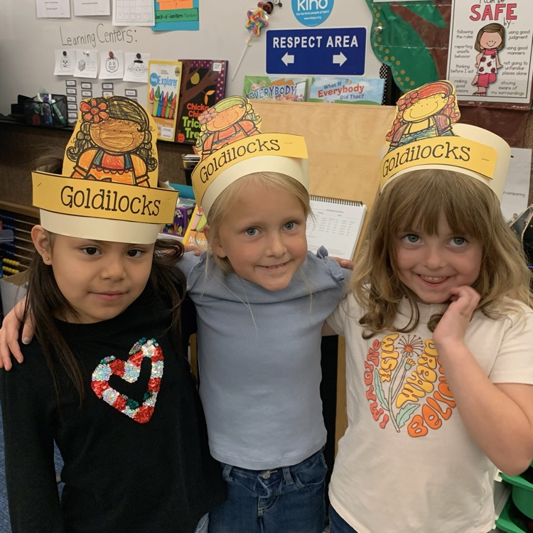 Group of 3 students in a Goldilocks hat!