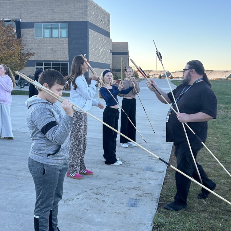 Students learning the atlatl.