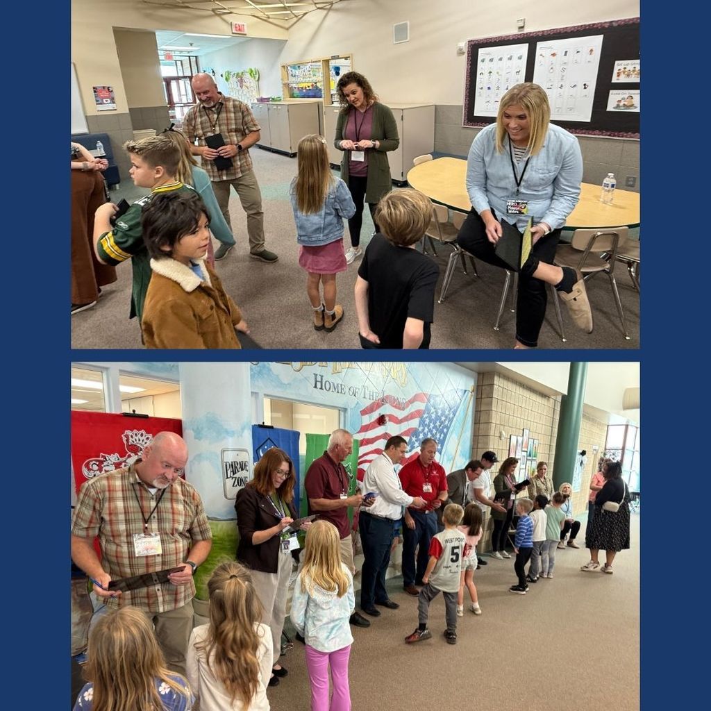 Students shaking hands with adult volunteers in the Amazing Shake Competition.