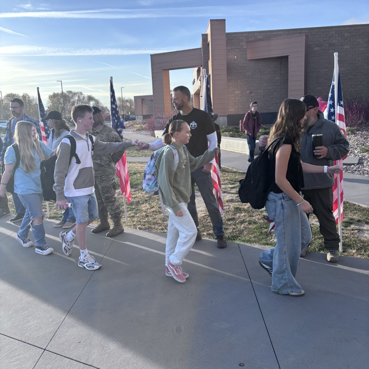 Students greeting Veterans