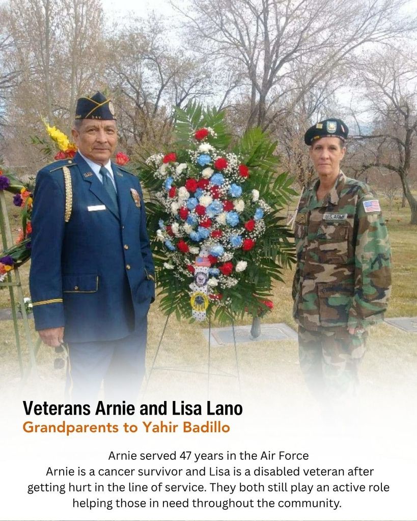 A man and woman standing at a grave site in their military uniforms. 