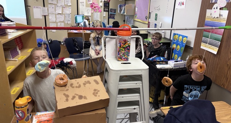 students playing Halloween party game