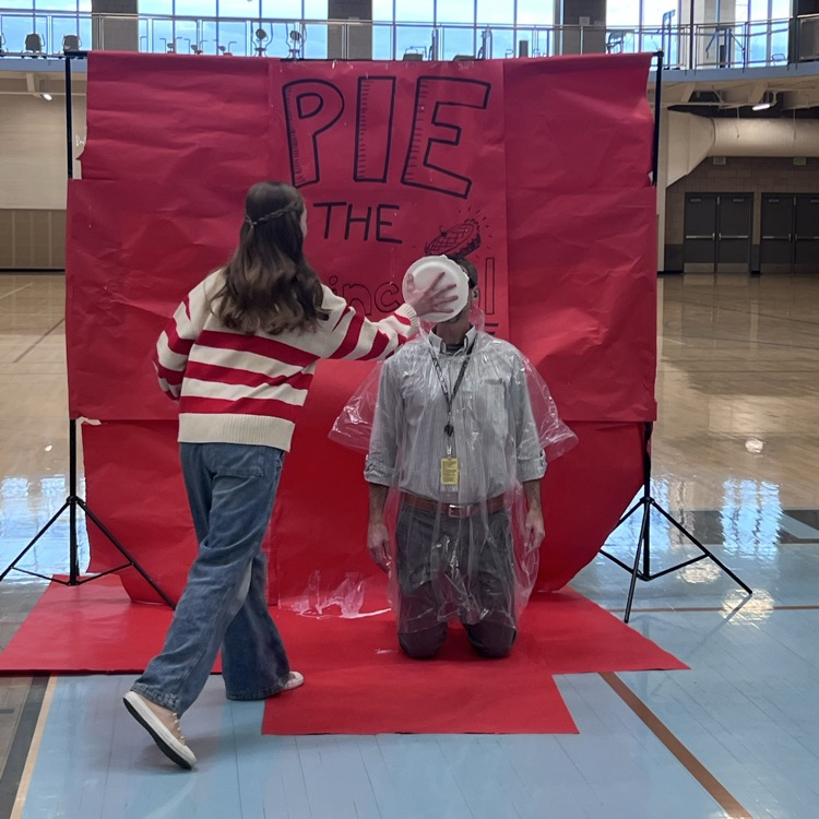 A student pies Mr. Hammer.