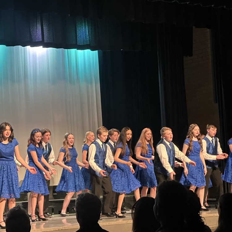 FFJH students singing & performing on stage