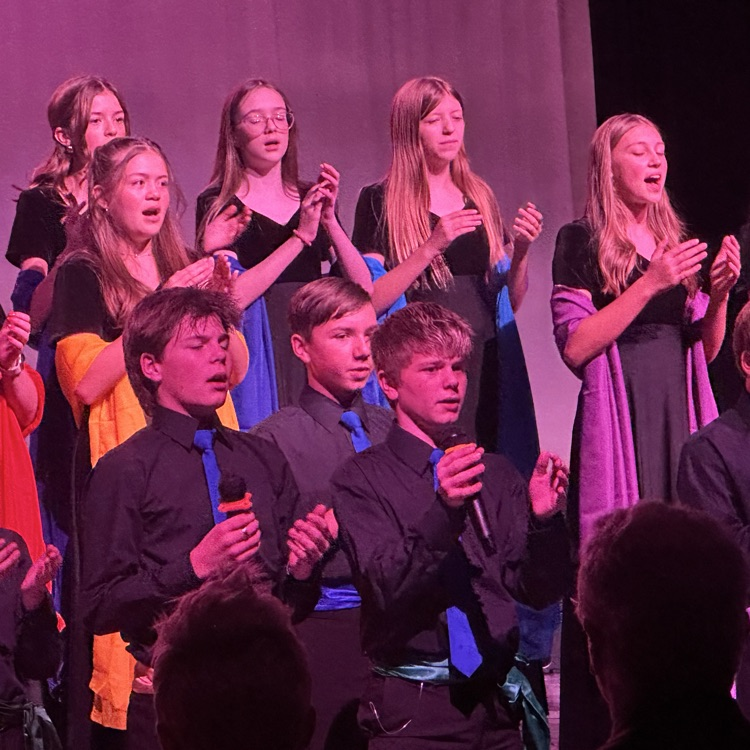 FFJH students singing & performing on stage