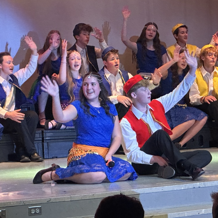 FFJH students singing & performing on stage