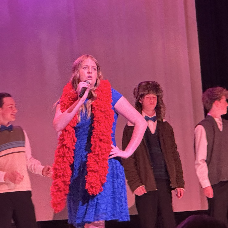 FFJH students singing & performing on stage