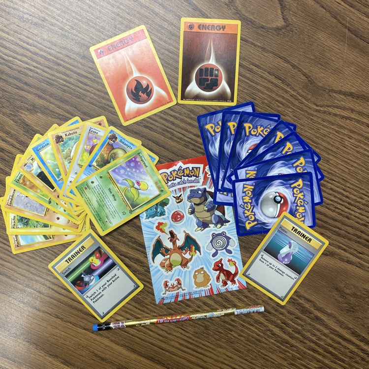 Pokémon cards, stickers, and pencil!