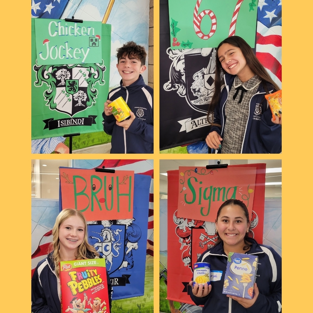Students in blue council jackets holding cans of food.